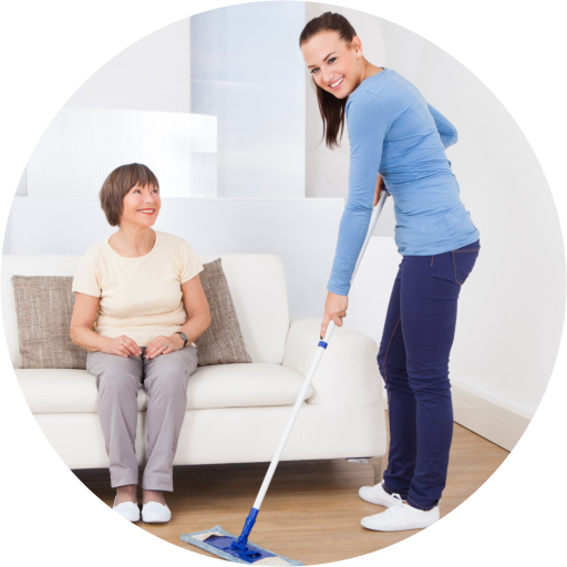 caregiver cleaning the floor